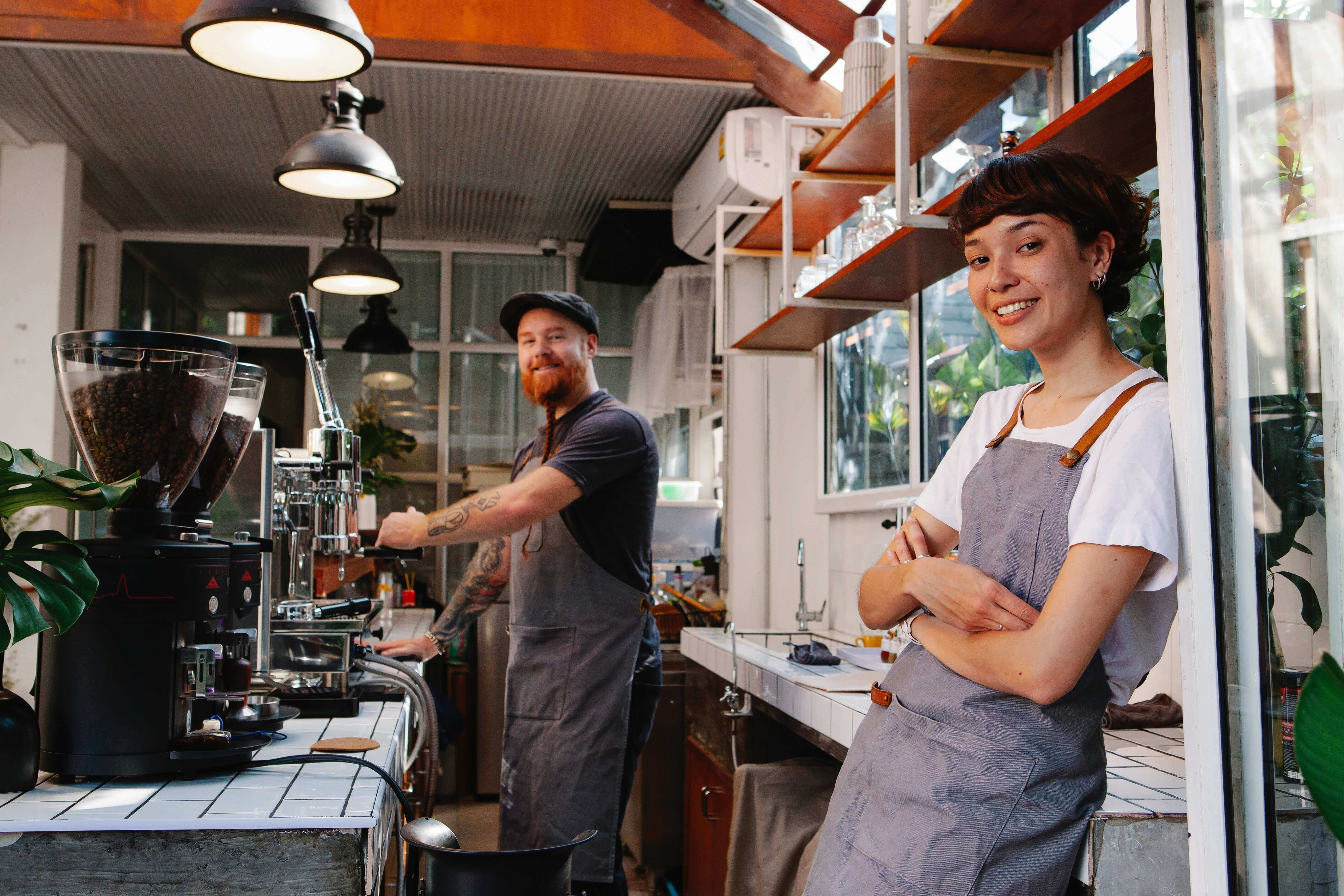 baristas in a coffee shop working in a happy environment